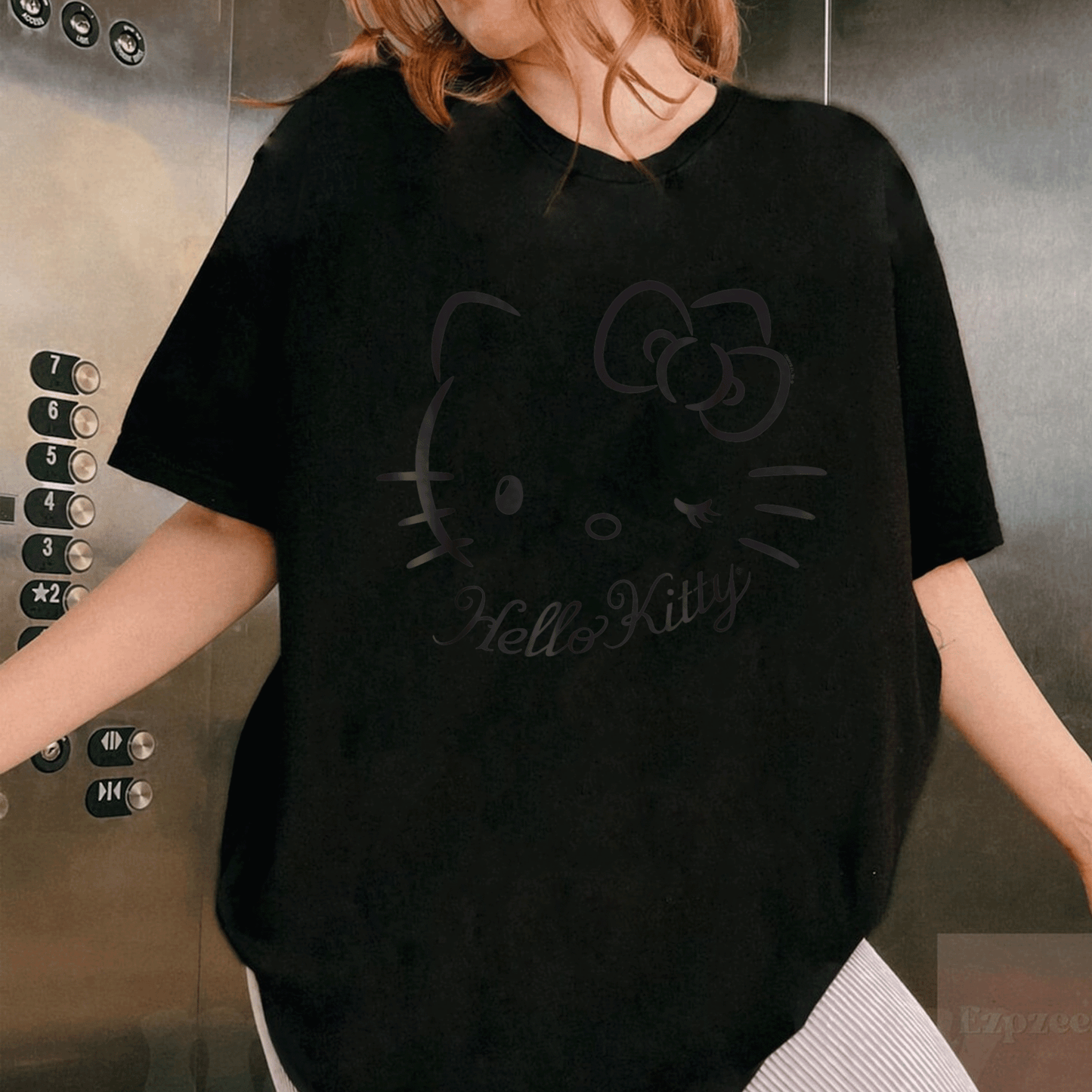 Charming Hello Kitty Winking Tee Shirt for Kids and Adults - Cute and Playful Design Perfect for Everyday Wear - 1