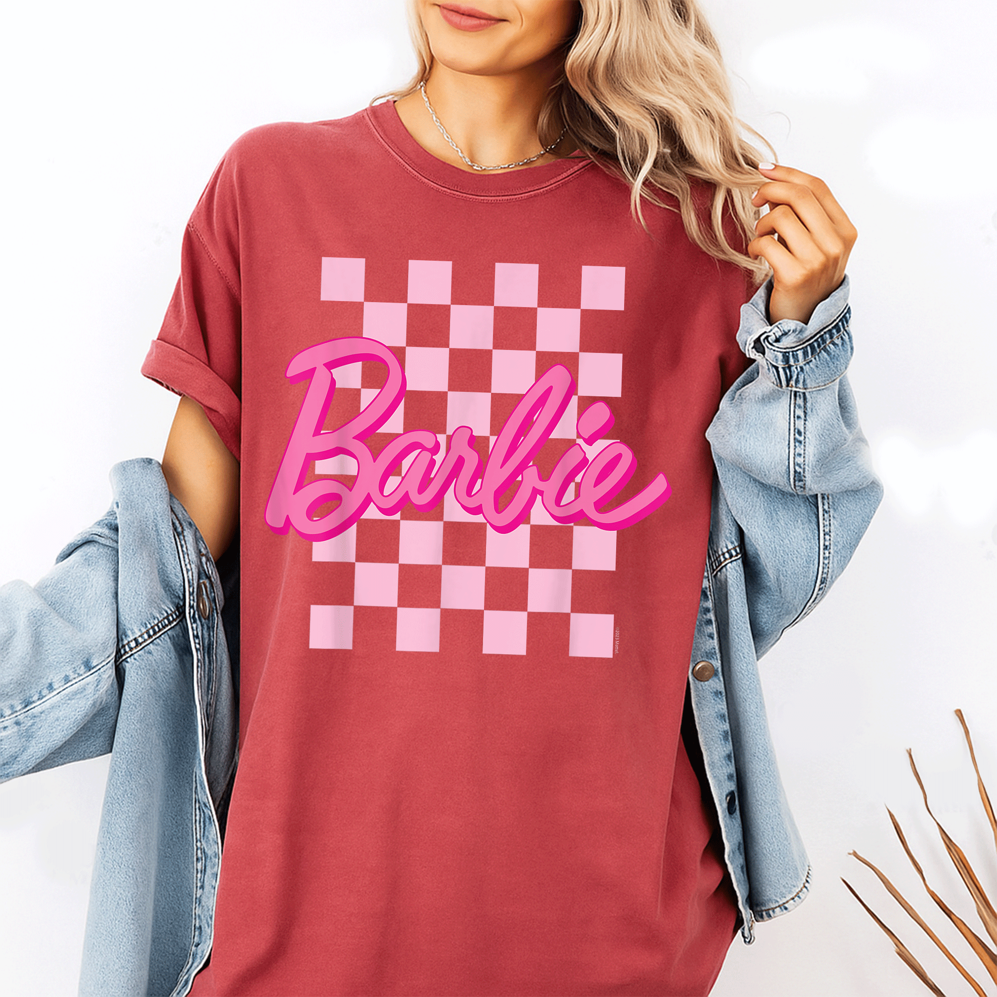 Trendy Barbie Logo T-Shirt with Checkered Background for Kids and Adults - Fun and Stylish Apparel for Barbie Fans - 1