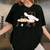 Cinnamoroll Cafe T-Shirt Cute and Cozy Design Featuring Adorable Cinnamoroll Character Perfect for Casual Outings or Gifts - 1