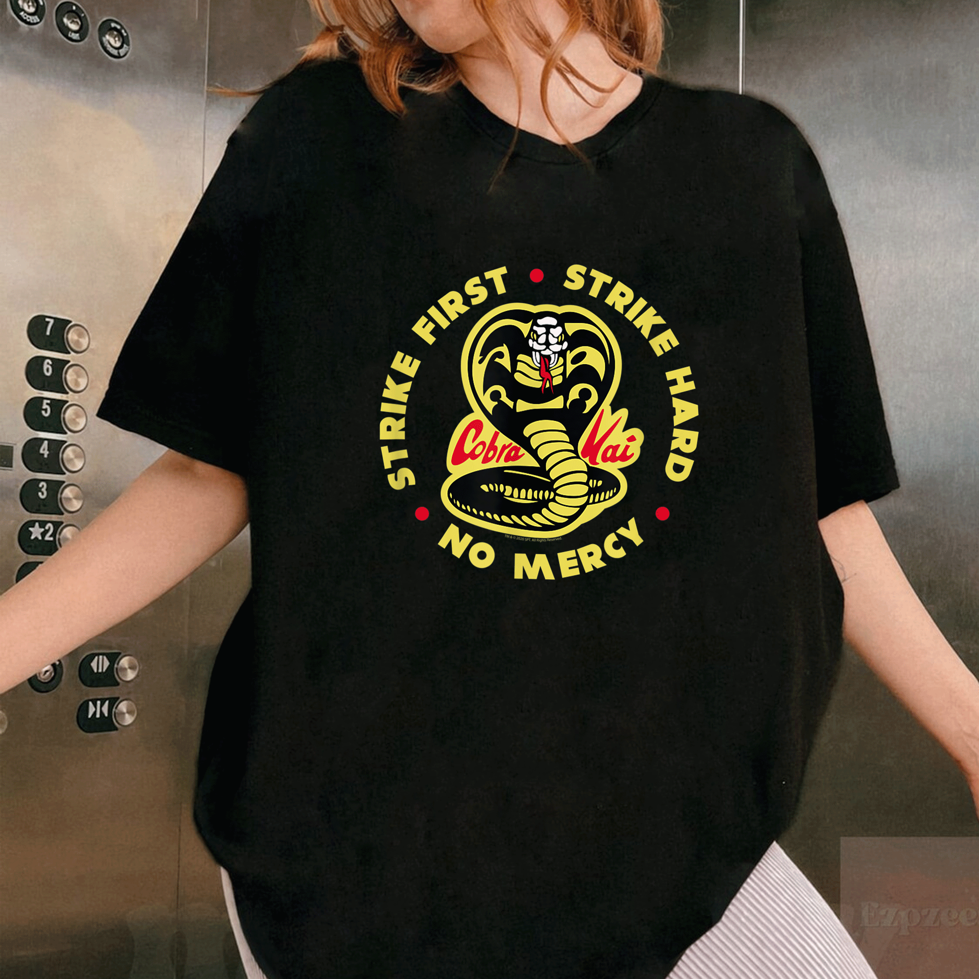 Cobra Kai Strike First Logo T-Shirt for Fans - Retro Style Graphic Tee Featuring Iconic Cobra Design and Bold Colors - 1
