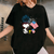 Snoopy and Woodstock American Flags T-Shirt - Fun Peanuts Graphic Tee for Casual Style and Fans of All Ages - 1