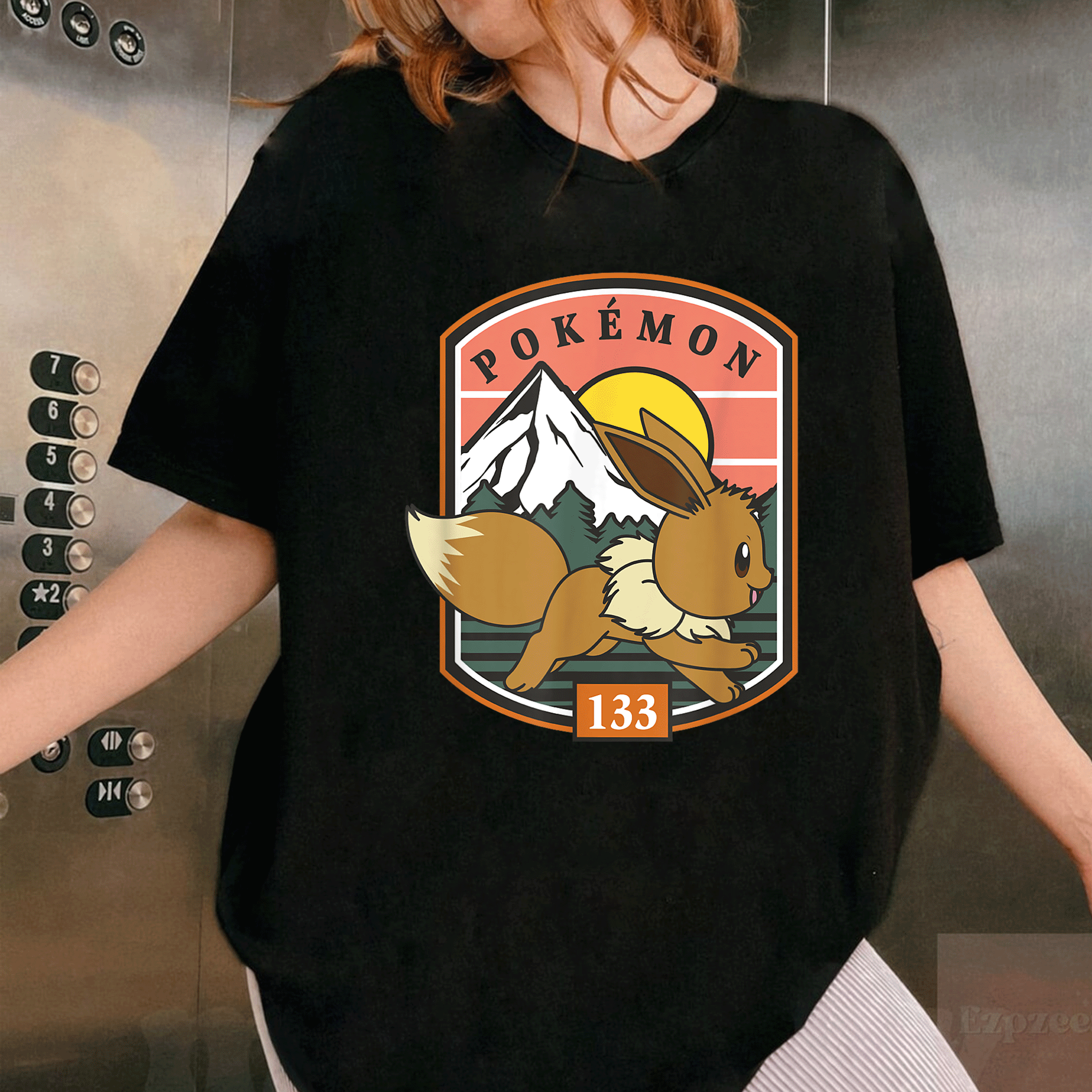 Eevee Outdoor Adventure Forest Park Badge T-Shirt for Pokémon Fans - Cute and Colorful Graphic Tee for Outdoor Fun - 1